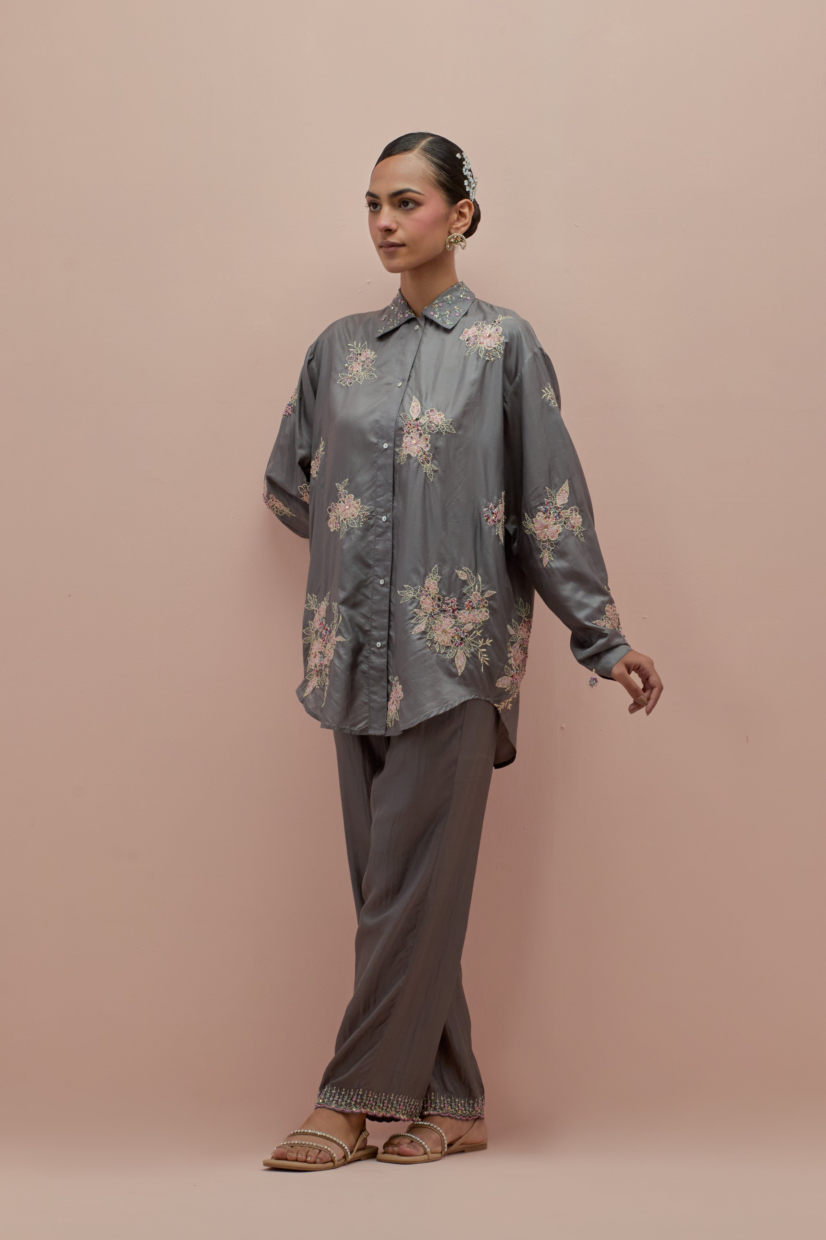 Iron grey silk, quilted short length front open jacket set with all-over sequins and multicolored beads work.