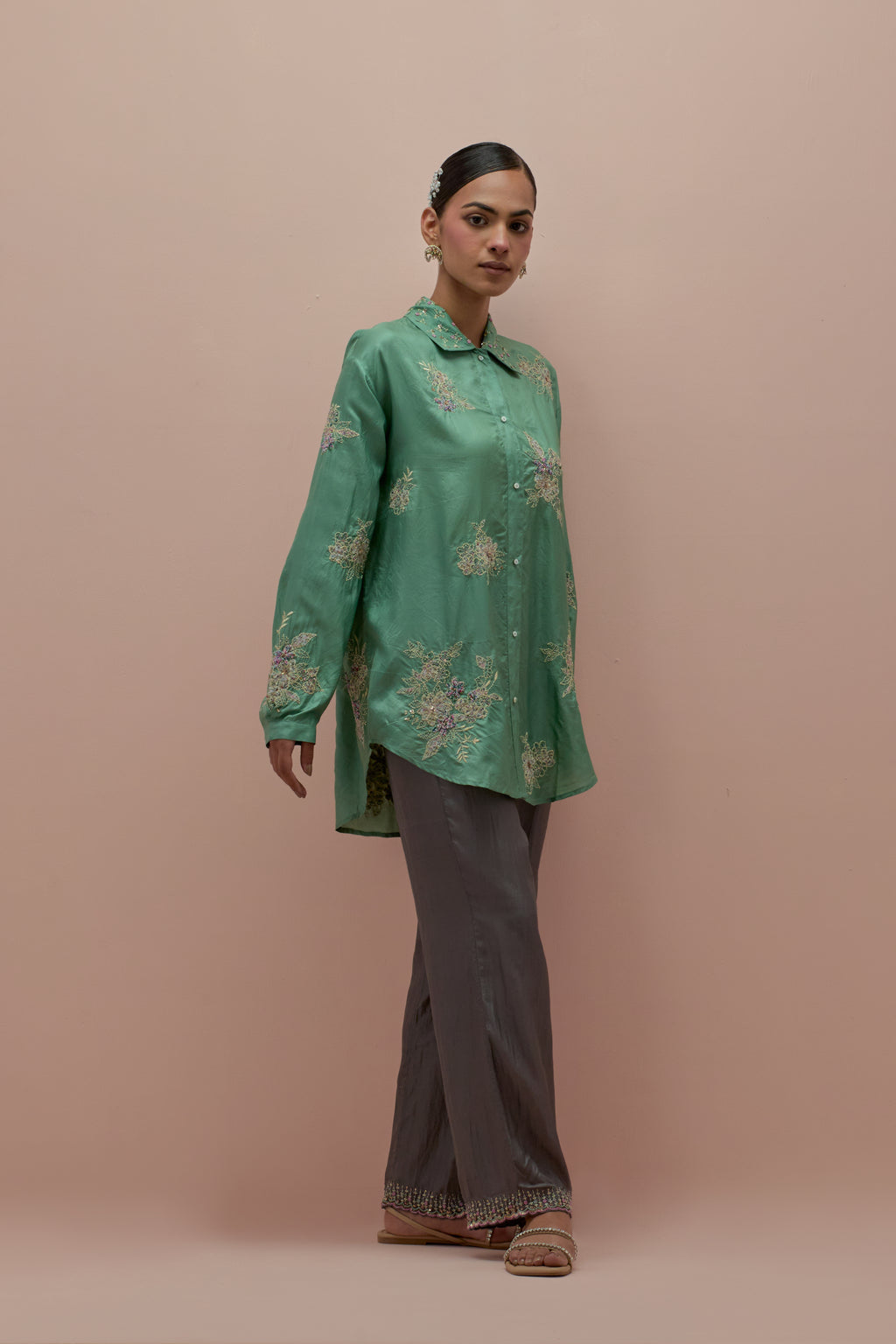 Jade green embroidered shirt with full sleeves.