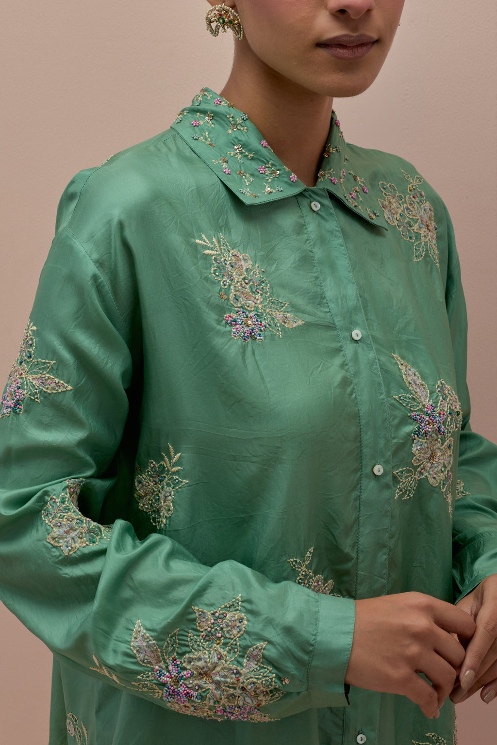 Jade green silk, quilted short length front open jacket set with all-over sequins and multicolored beads work.