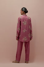 Salmon pink embroidered shirt with full sleeves.