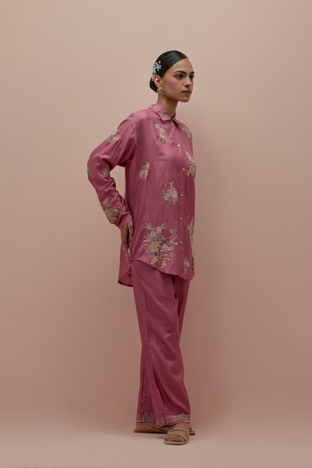 Salmon pink embroidered shirt with full sleeves.