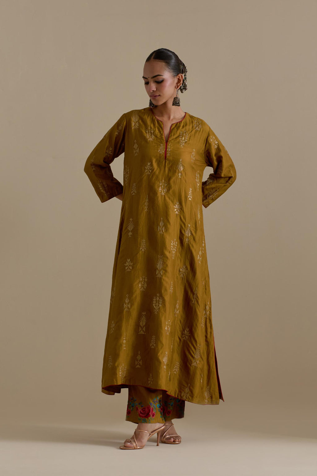 Olive silk straight long kurta set, highlighted with dull gold zari and sequins handwork.