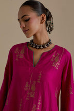 Fuchsia silk A-line short kurta set, highlighted with dull gold zari and sequins handwork.