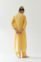 Yellow silk chanderi long straight kurta set highlighted with off white thread embroidery