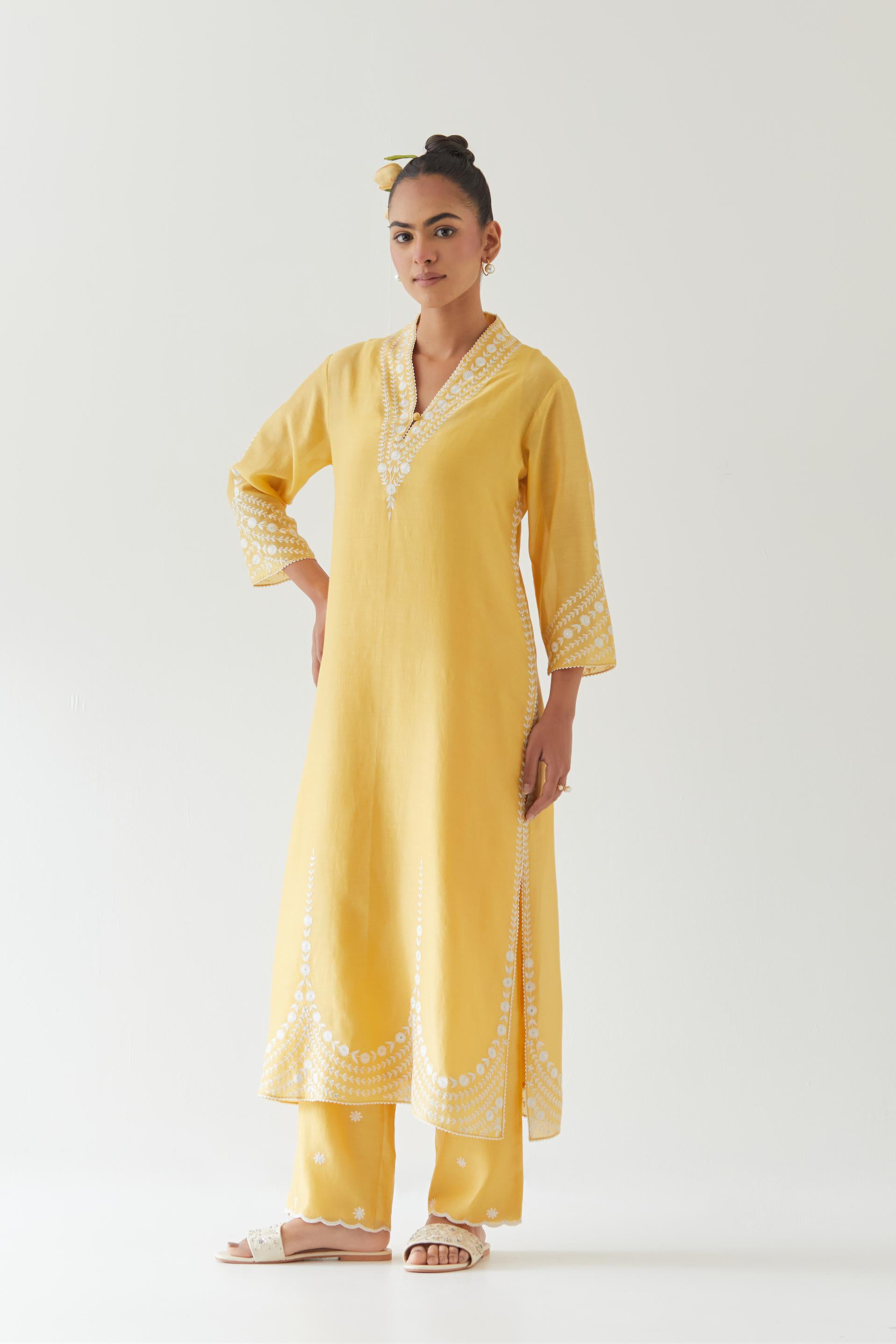 Yellow silk chanderi long straight kurta set highlighted with off white thread embroidery