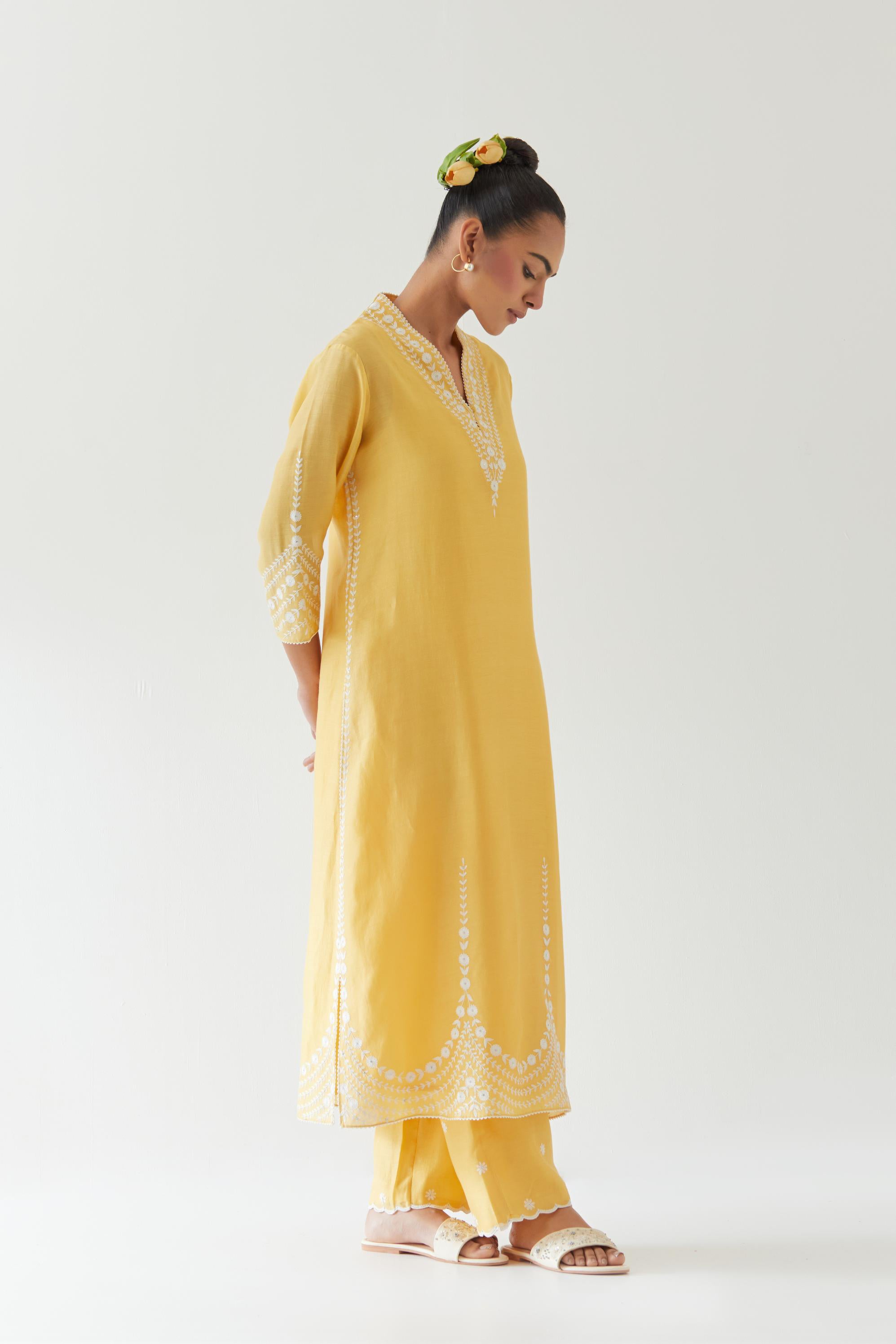 Yellow silk chanderi long straight kurta set highlighted with off white thread embroidery