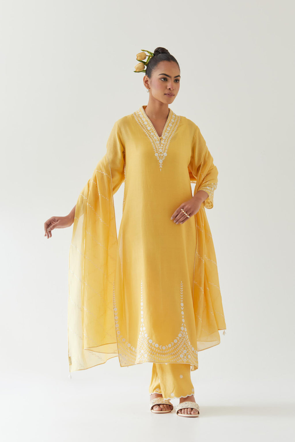 Yellow silk chanderi long straight kurta set highlighted with off white thread embroidery