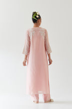 Pink silk chanderi straight kurta set highlighted with off white thread embroidery.