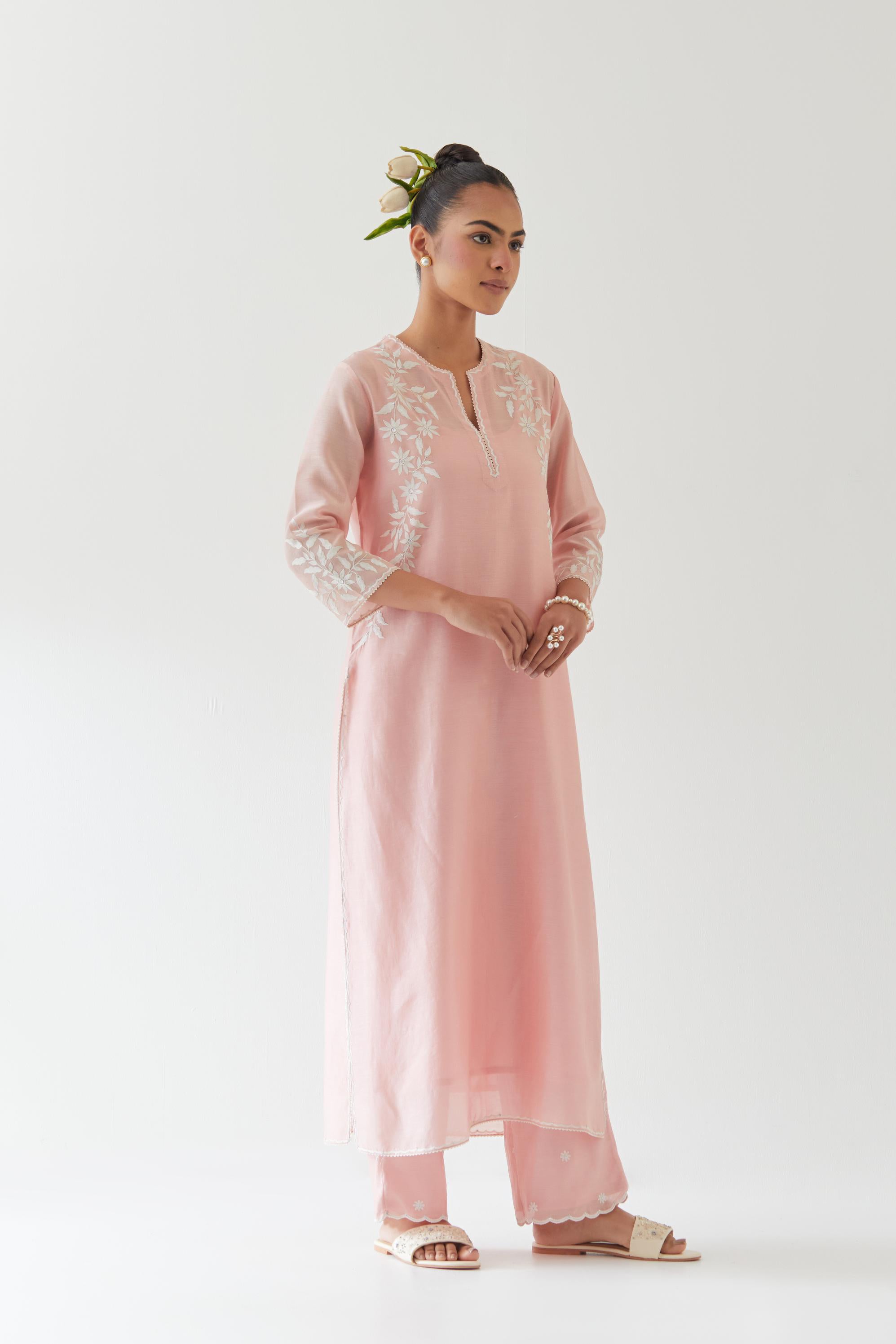 Pink silk chanderi straight kurta set highlighted with off white thread embroidery.