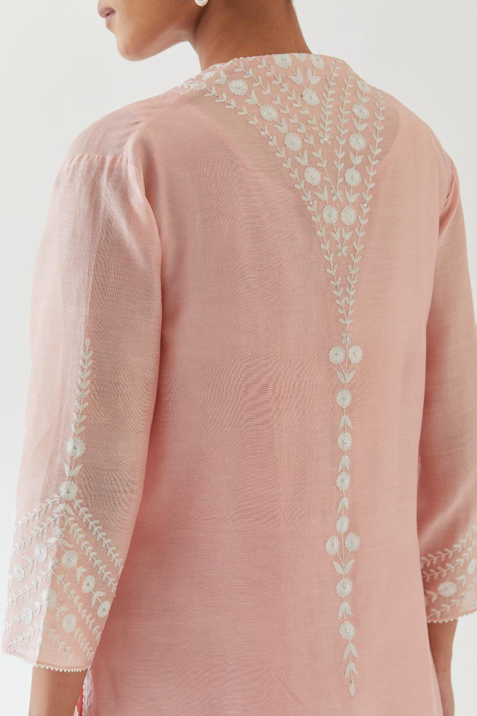 Pink silk chanderi long straight kurta set highlighted with off white thread embroidery
