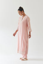 Pink silk chanderi long straight kurta set highlighted with off white thread embroidery