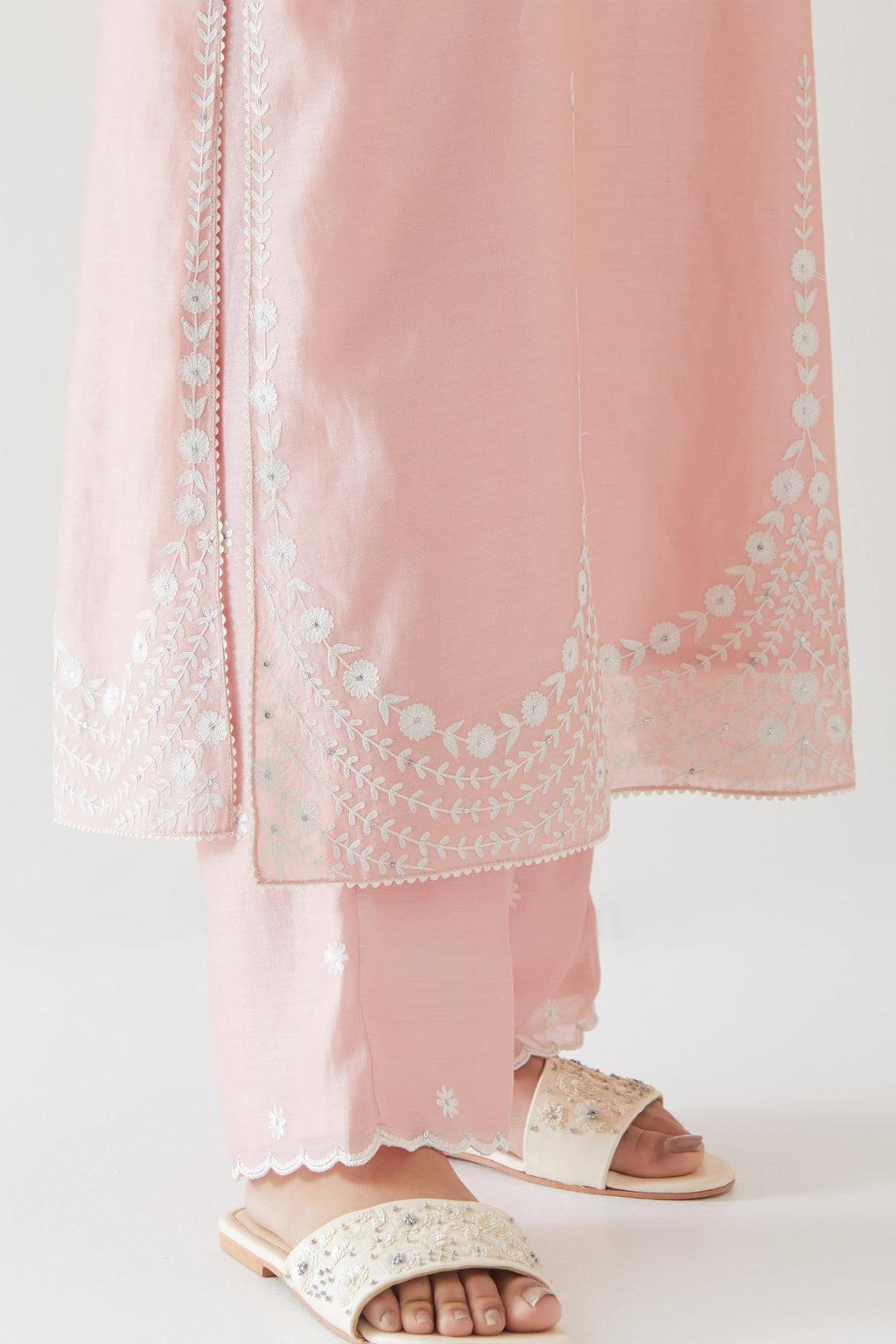 Pink silk chanderi long straight kurta set highlighted with off white thread embroidery