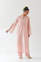 Pink silk chanderi straight kurta set with long bell sleeves, highlighted with off white thread embroidery.