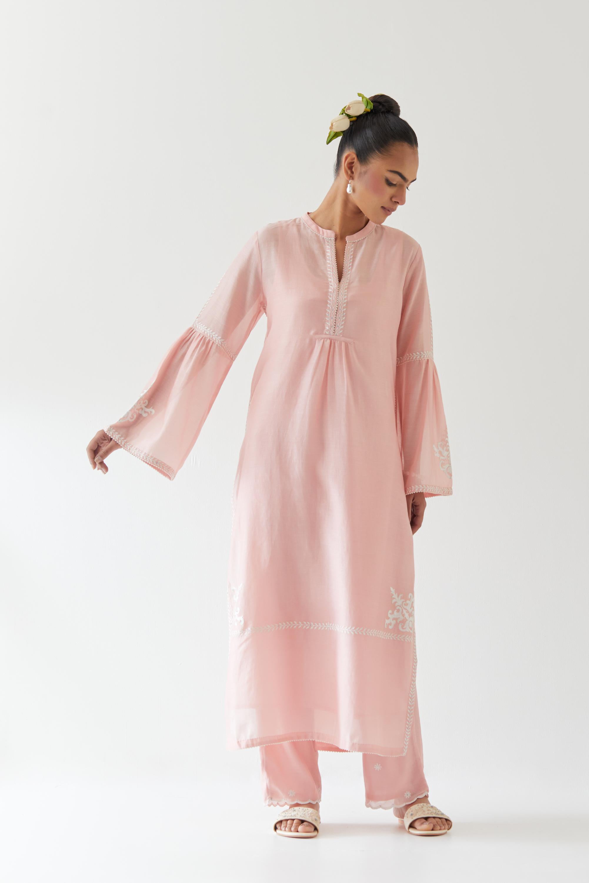 Pink silk chanderi straight kurta set with long bell sleeves, highlighted with off white thread embroidery.