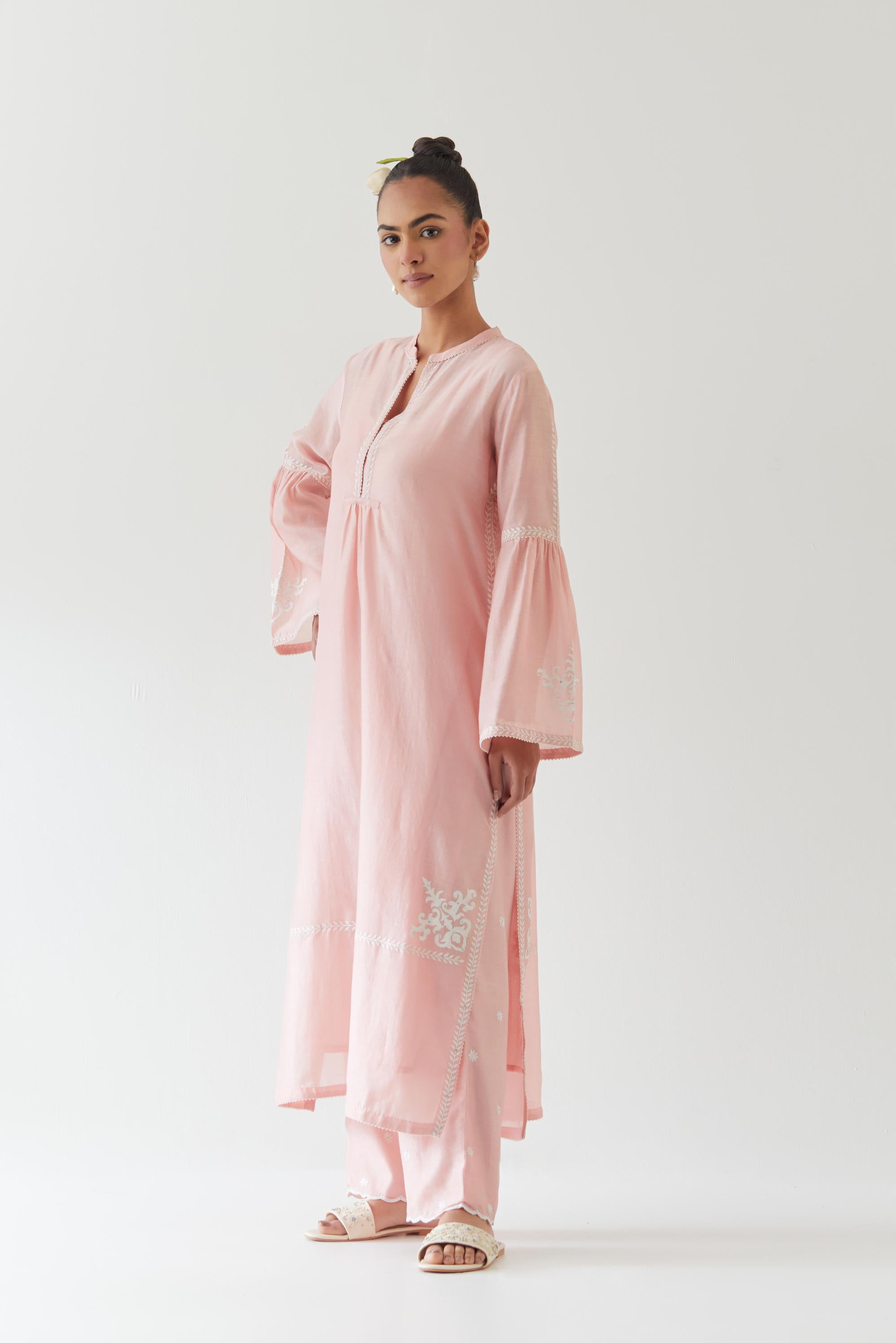 Pink silk chanderi straight kurta set with long bell sleeves, highlighted with off white thread embroidery.