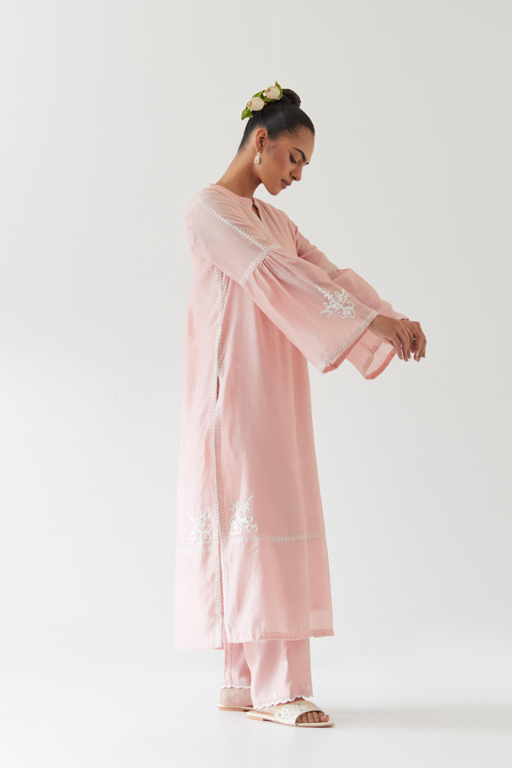 Pink silk chanderi straight kurta set with long bell sleeves, highlighted with off white thread embroidery.
