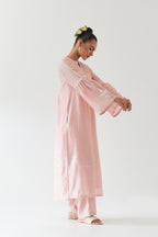 Pink silk chanderi straight kurta set with long bell sleeves, highlighted with off white thread embroidery.