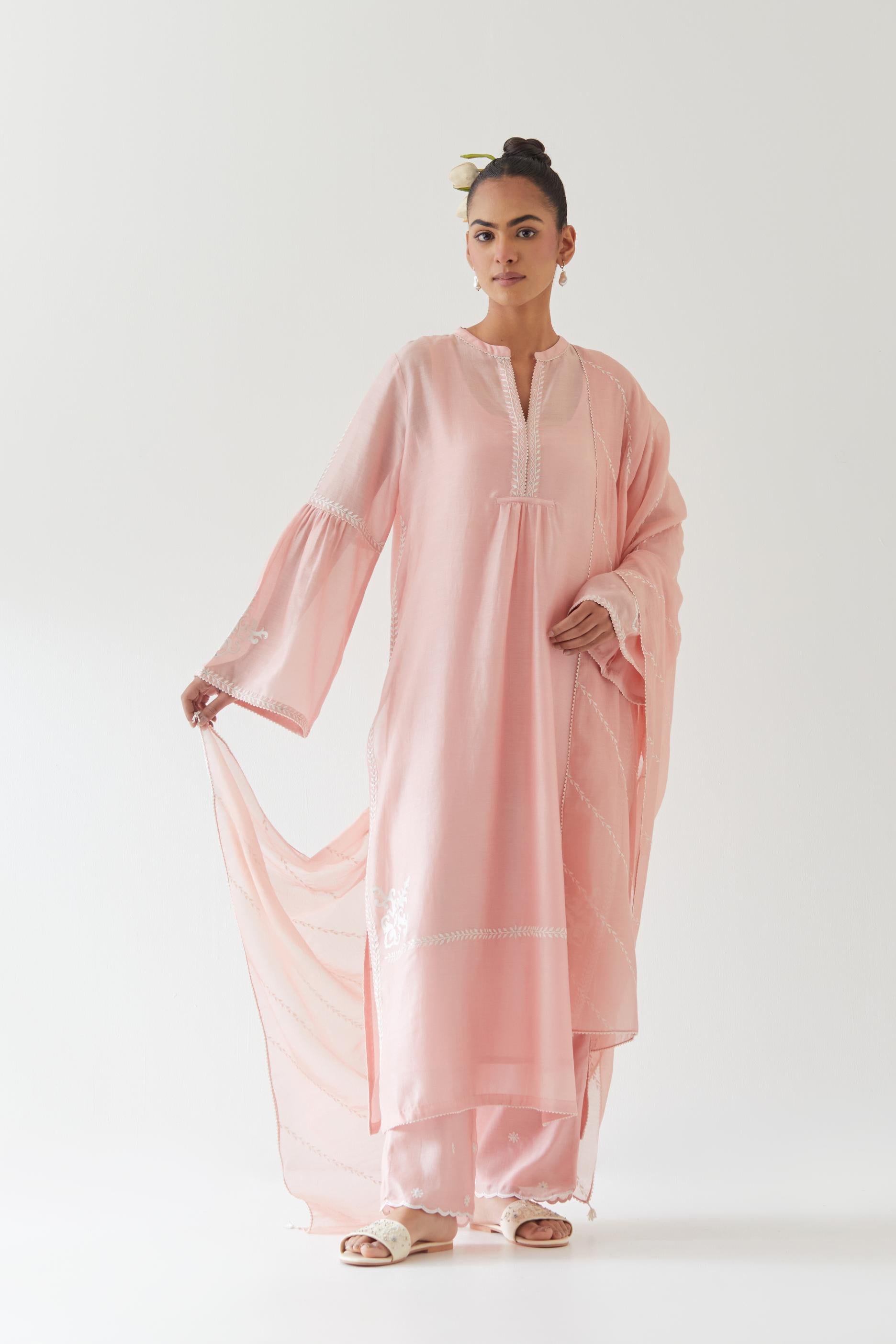 Pink silk chanderi straight kurta set with long bell sleeves, highlighted with off white thread embroidery.