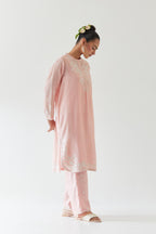 Pink silk chanderi straight short kurta set with off white thread embroidery.