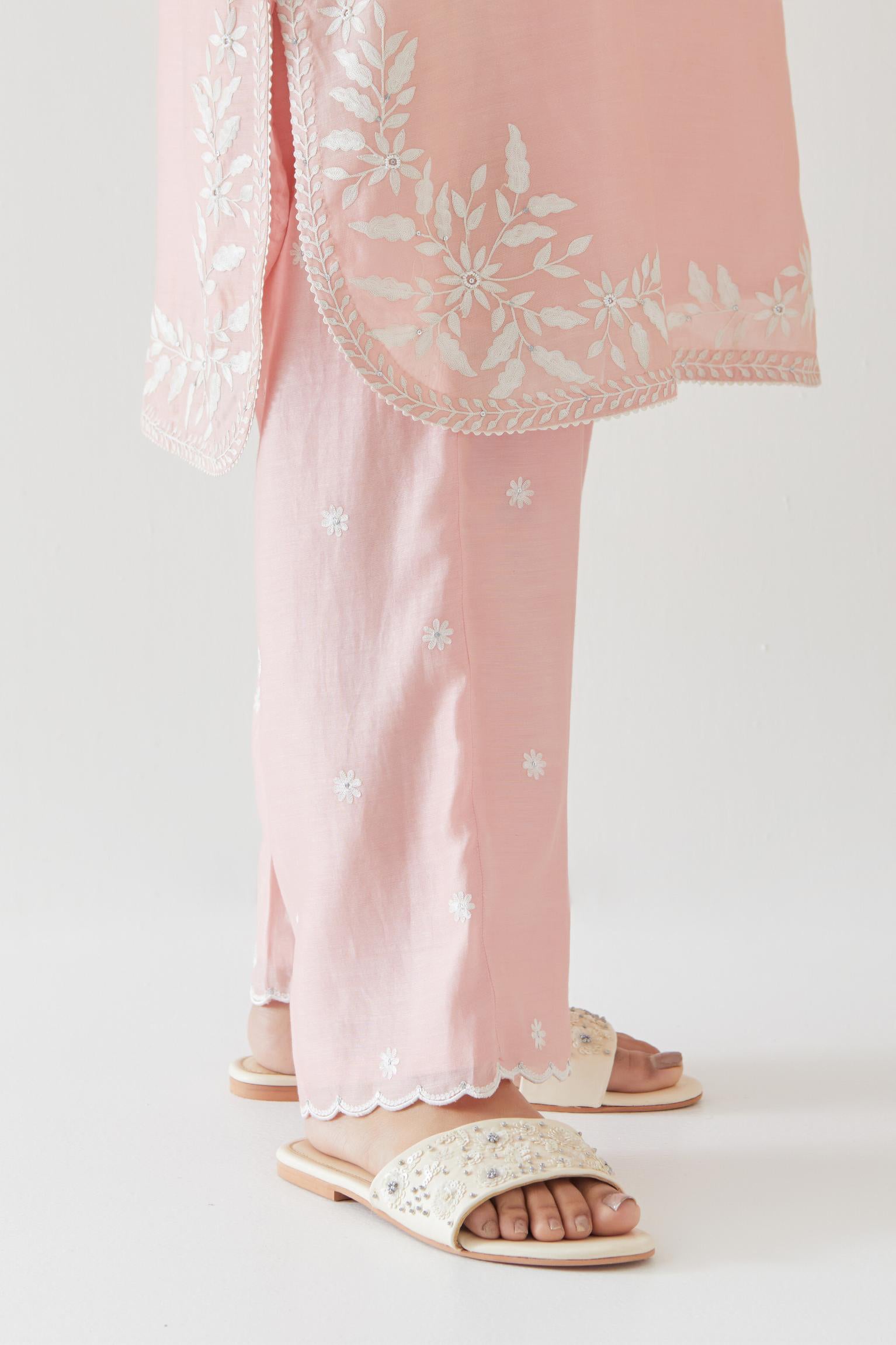 Pink silk chanderi straight short kurta set with off white thread embroidery.