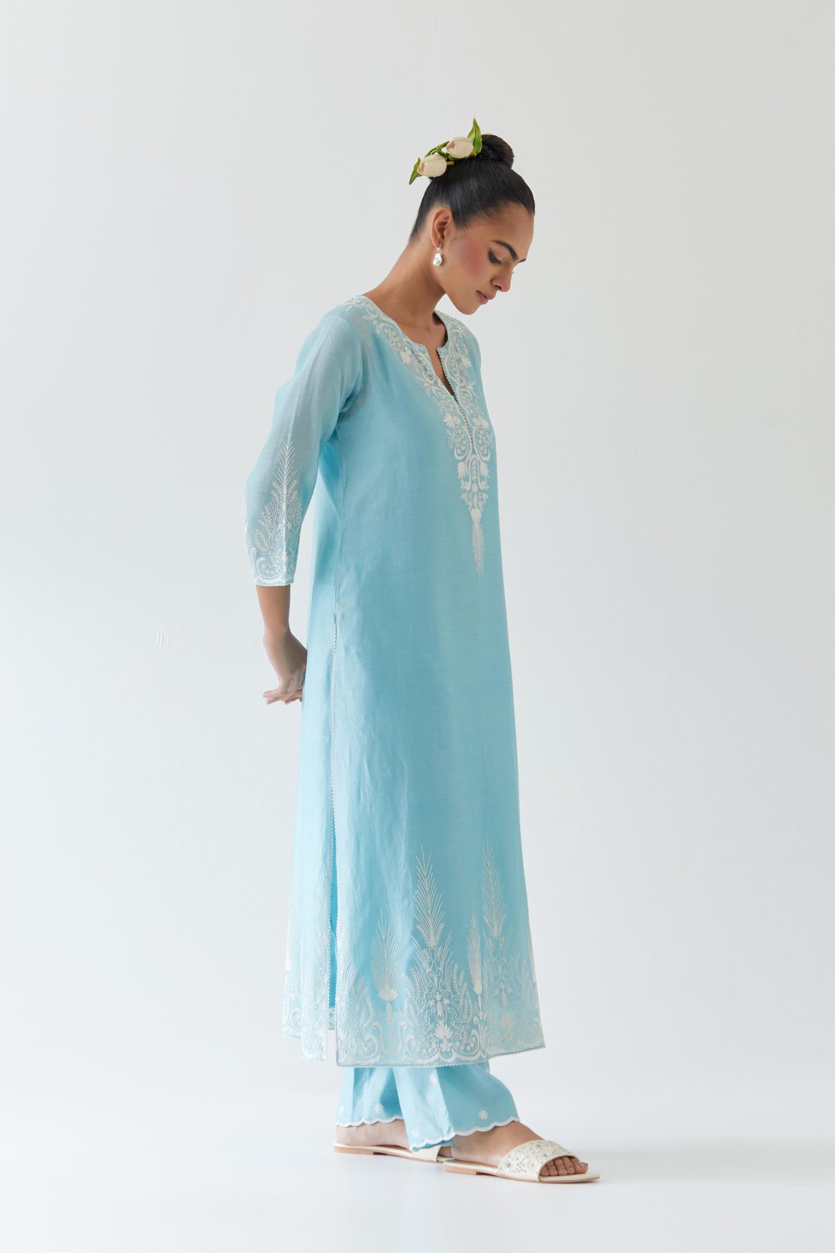 Blue silk chanderi straight kurta set highlighted with off white thread embroidery.