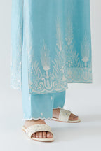 Blue silk chanderi straight kurta set highlighted with off white thread embroidery.