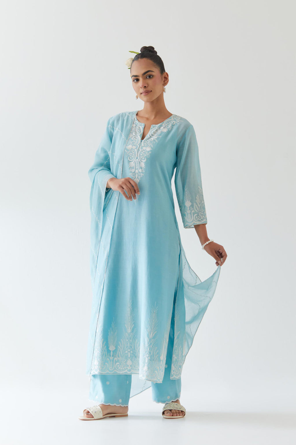 Blue silk chanderi straight kurta set highlighted with off white thread embroidery.