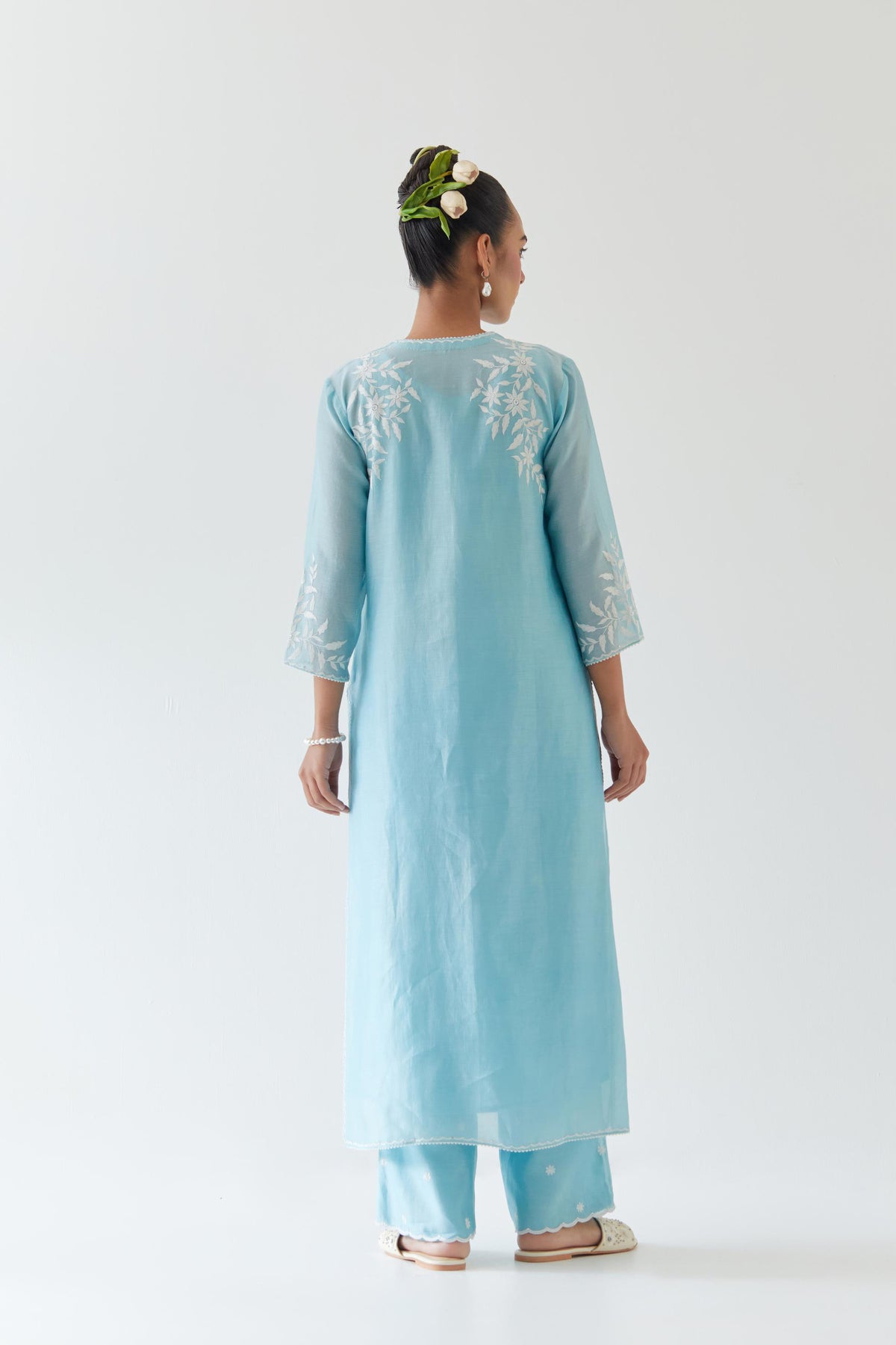 Blue silk chanderi straight kurta set highlighted with off white thread embroidery.