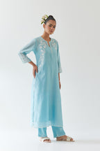 Blue silk chanderi straight kurta set highlighted with off white thread embroidery.