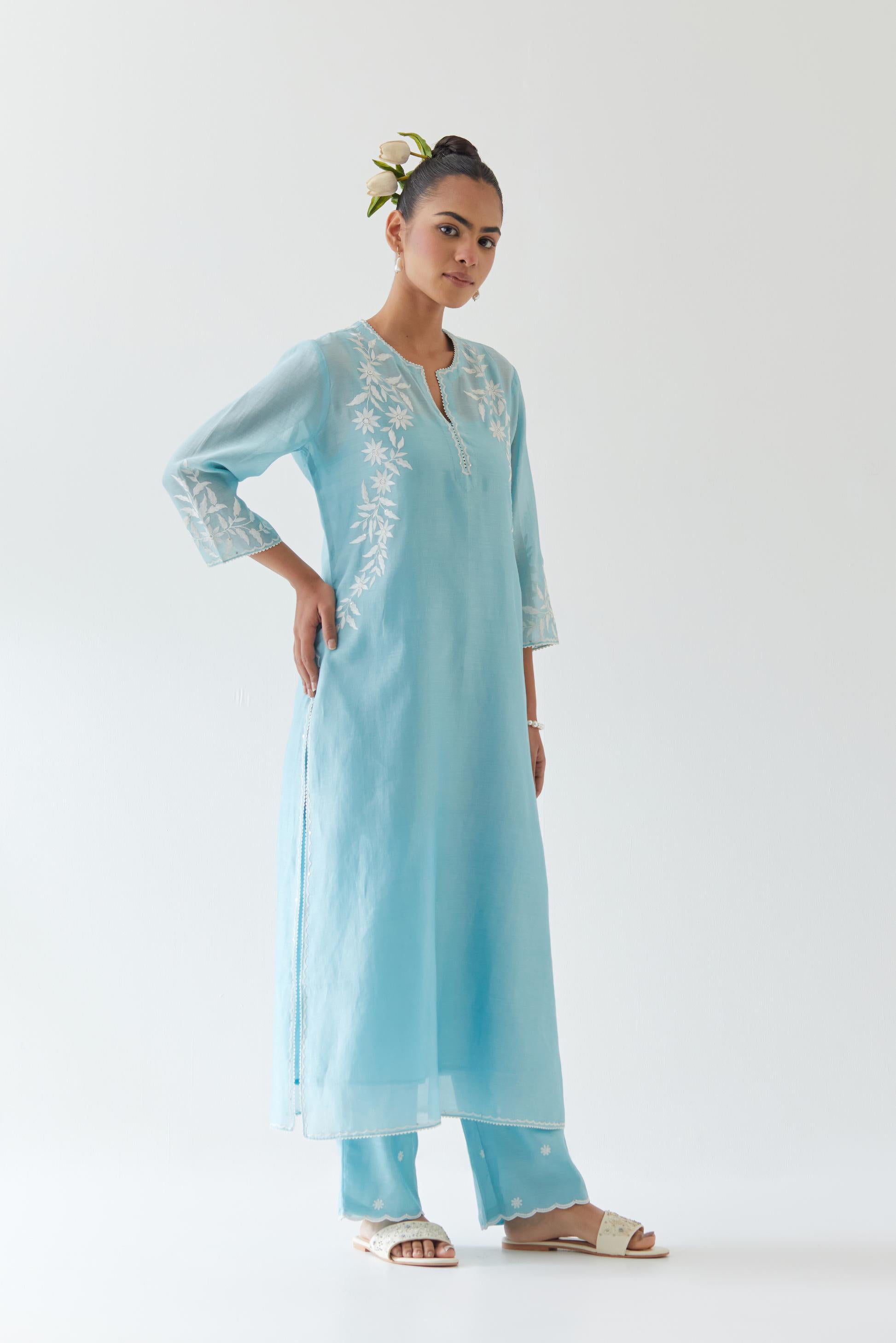 Blue silk chanderi straight kurta set highlighted with off white thread embroidery.