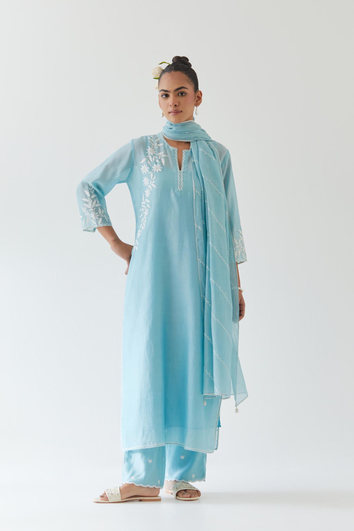 Blue silk chanderi straight kurta set highlighted with off white thread embroidery.