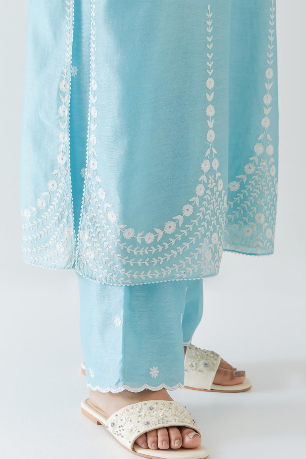 Blue silk chanderi long straight kurta set highlighted with off white thread embroidery