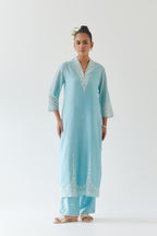 Blue silk chanderi long straight kurta set highlighted with off white thread embroidery