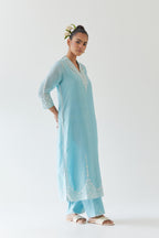 Blue silk chanderi long straight kurta set highlighted with off white thread embroidery