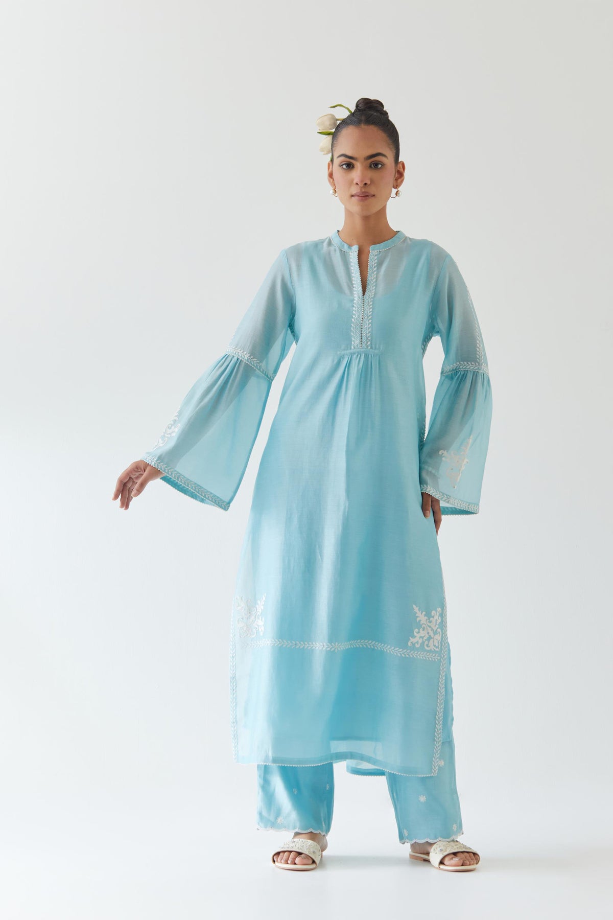 Blue silk chanderi straight kurta set with long bell sleeves, highlighted with off white thread embroidery.