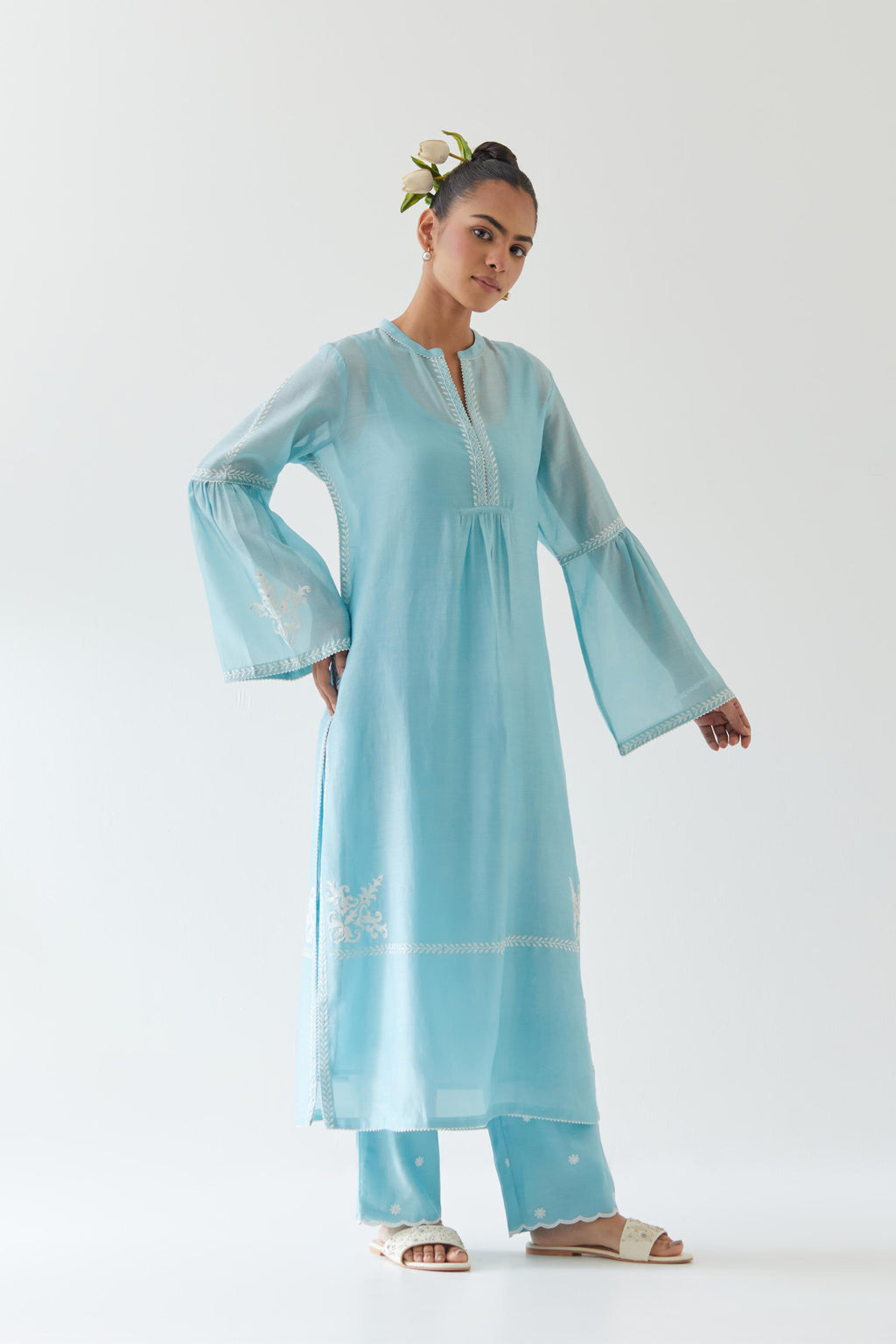 Blue silk chanderi straight kurta set with long bell sleeves, highlighted with off white thread embroidery.