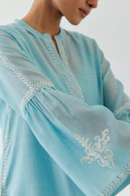 Blue silk chanderi straight kurta set with long bell sleeves, highlighted with off white thread embroidery.