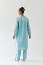 Blue silk chanderi straight short kurta set with off white thread embroidery.