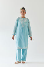Blue silk chanderi straight short kurta set with off white thread embroidery.