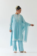 Blue silk chanderi straight short kurta set with off white thread embroidery.