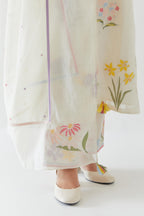 Off white cotton straight kurta set with all-over multi colored applique, highlighted with bead & sequins work.