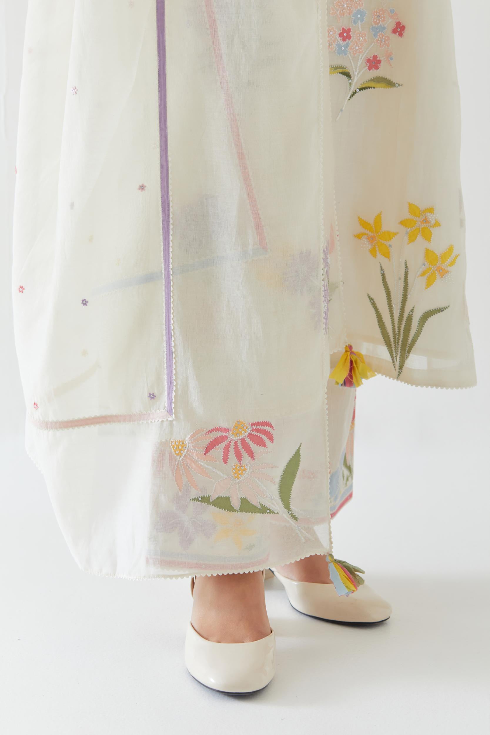 Off white cotton straight kurta set with all-over multi colored applique, highlighted with bead & sequins work.