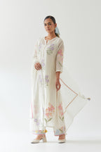 Off white cotton straight side paneled kurta set with all-over multi colored applique, highlighted with bead & sequins work.