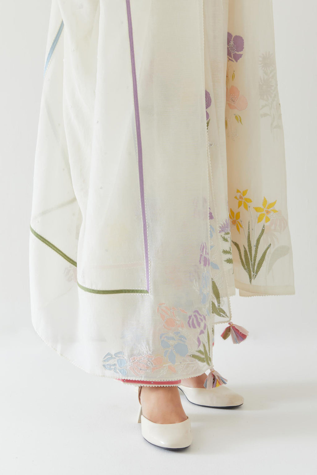 Off white cotton chanderi dupatta with multi colored applique, highlighted with bead & sequins work.