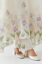 Off white cotton chanderi easy fit, asymmetric hem, paneled kurta set with applique work at hem and sleeves.