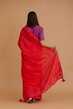 Red hand crushed silk saree set, paired with purple hand crushed silk blouse with vertical inset stripe organza fabric detailing in front, back and sleeves, highlighted with contrasting top stitch.