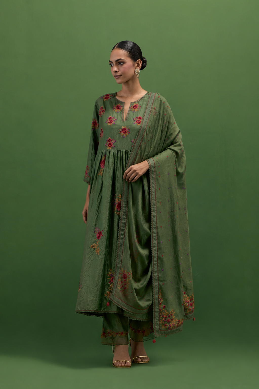 Brunswick green silk Kurta dress set with all-over assorted thread embroidery floral bunches.