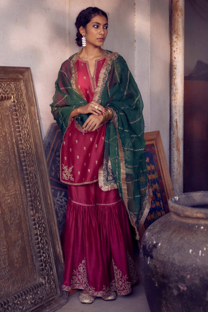Fuchsia silk chanderi short kurta set with all-over silk thread jaal embroidery, detailed with gold dori embroidery.