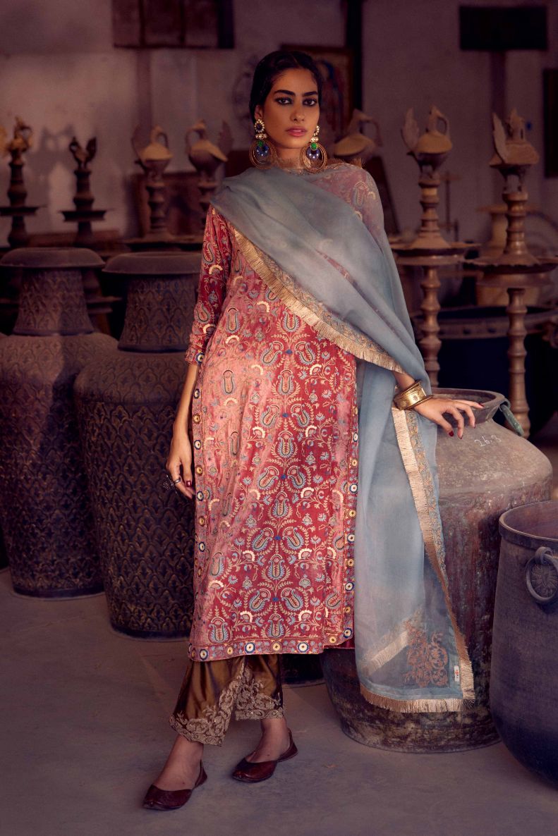 Brick red silk velvet straight kurta set with multi colored silk thread jaal embroidery all over it, detailed with single line of zardosi work.