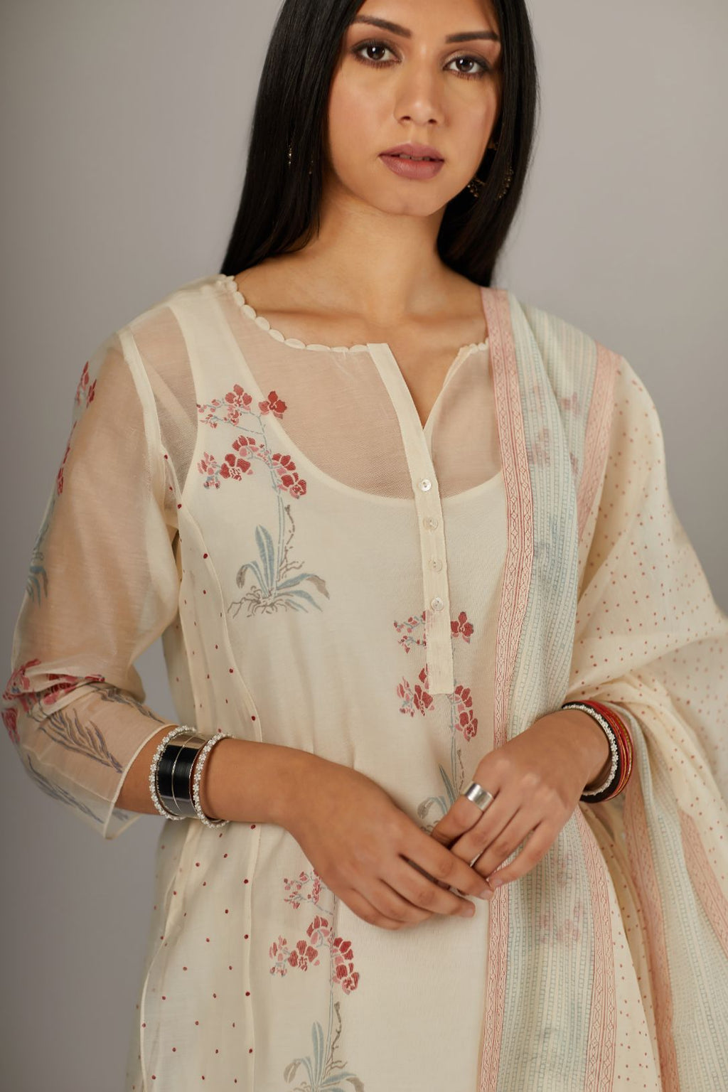 Straight kurta set with an all-over hand block print and side panels.